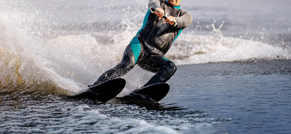man riding water ski
